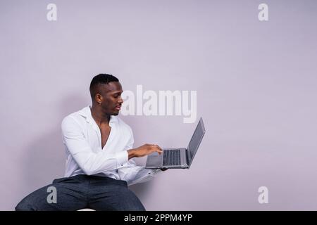 African American millennial businessman isolated on studio background, successful male formal suit Stock Photo