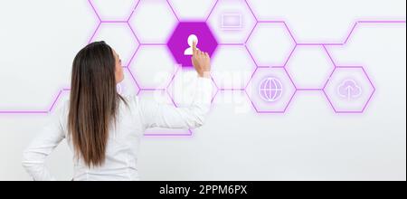 Businesswoman in white office sirt standing and pressing virtual button with her finger. Women presenting new technologies for future. Futuristic digital design. Stock Photo