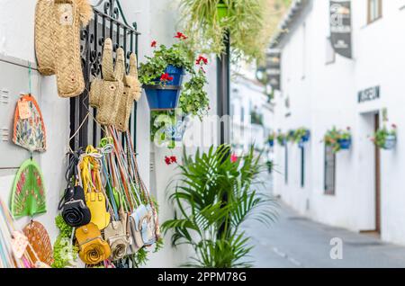 MIJAS, SPAIN - OCTOBER 9, 2021: Souvenir and handicraft shop, with ceramics and other typical products in the village of Mijas on the Costa del Sol, Malaga province, Andalusia, southern Spain Stock Photo