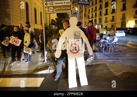 Man cyclist shows human silhouette with prohibition sign to overcome speed 30 km/h Stock Photo