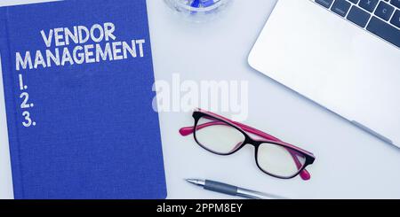 Sign displaying Vendor Management. Business overview activities included in researching and sourcing vendors Stock Photo