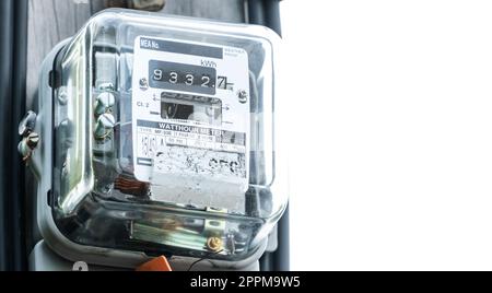 Watt hour meter. Electric power box meter measuring power usage in home. Watt hour electric meter measurement tool at pole for house use. Watt hour meter for reading home electricity consumption. Stock Photo