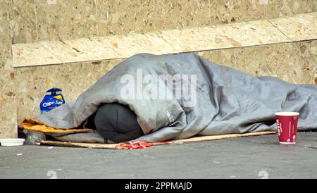 Glasgow, Scotland, UK 24th , April, 2023. UK Weather: Sunny city centre saw an increase in street begging. Credit Gerard Ferry/Alamy Live News Stock Photo
