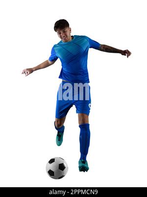 Football player ready to kick the soccerball during the match Stock Photo