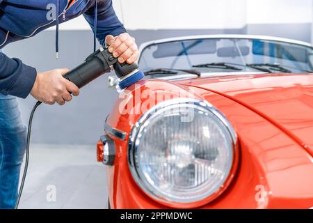 detailing of car body, polishing with using a mechanical sander, care about the car, automotive Stock Photo
