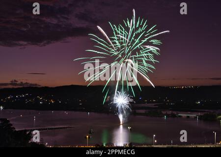 A breathtaking view of a fireworks display over the Brisbane Water in Australia Stock Photo