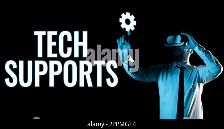 Sign displaying Tech Supports. Word for Help given by technician Online or Call Center Customer Service Stock Photo
