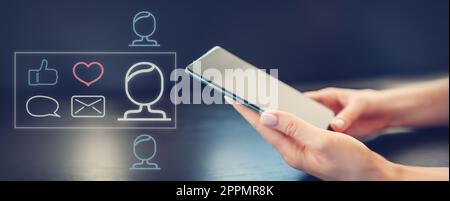 Woman holding in her hands smartphone and chatting. Stock Photo
