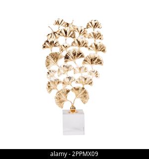 gold leaf figure on white marble stand isolated on white Stock Photo