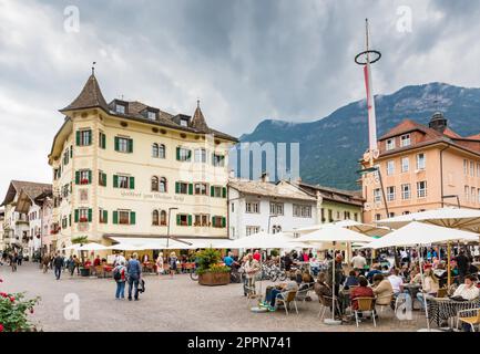 KALTERN, ITALY - SEPTEMBER 22: People at the market square of Kaltern, Italy on September 22, 2015. Kaltern is famous for its viniculture. Foto taken Stock Photo