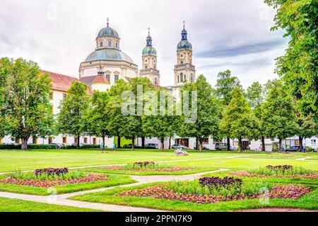 KEMPTEN, GERMANY - JUNE 9: People in park at the Basilica of Keptem, Germany on June 9, 2017. Kempten is one of the oldest cities of Germany Stock Photo