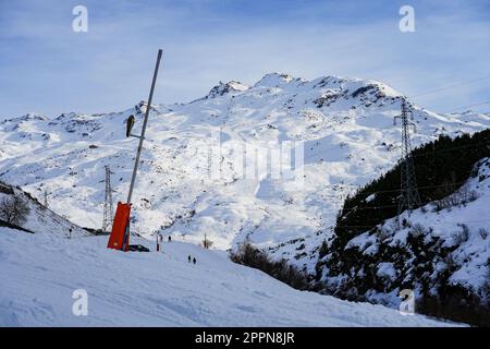 Caron peak as seen from a ski slope in Les Ménuires ski station at sunset Stock Photo