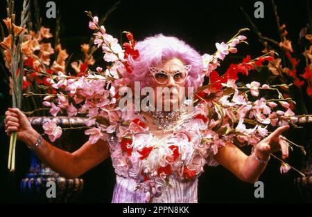 Barry Humphries (Dame Edna Everage) in BACK WITH A VENGEANCE at the Strand Theatre, London WC2  17/11/1987  costumes: Billy Goodwin  lighting: Durham Marenghi  choreographer: Sam Spencer-Lane Stock Photo