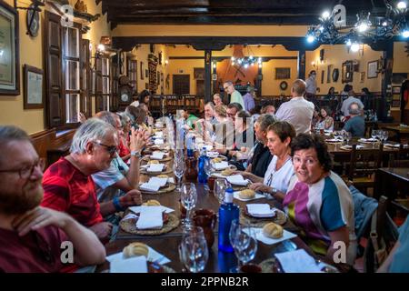 Interior of the Restaurant Meson los templarios in Villalcazar de Sirga located on the Way of Santiago, in which the wooden carving in the shape of a Stock Photo