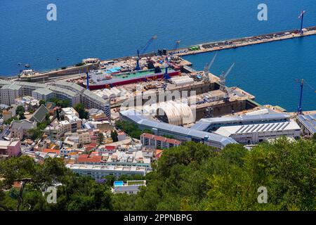 Aerial view of the harbor of Gibraltar as seen from the top of the rock of Gibraltar in the south of Spain Stock Photo
