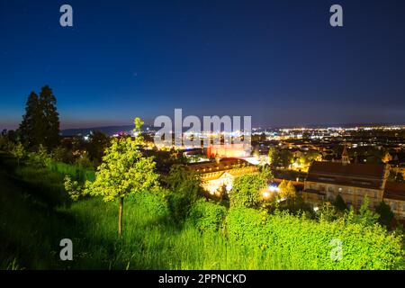 Aerial view over the city of Bamberg at night with stars at the sky Stock Photo
