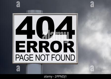 Close-up on a white billboard against a threatening sky with the message "404 Error Page not found" written in the middle. Stock Photo