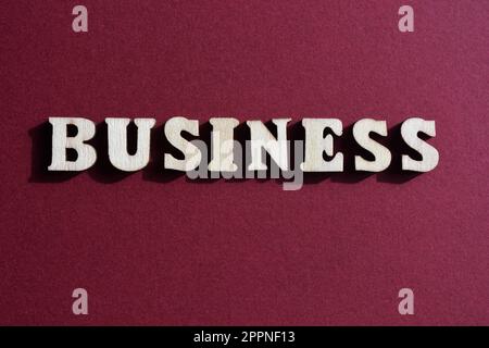 Business, word in wooden alphabet letters isolated on background Stock Photo