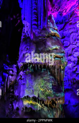 Colored lights inside Saint Michael's cave in the rock of Gibraltar in southern Spain Stock Photo