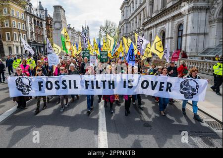 London, UK. 24th Apr, 2023. The March to end fossil fuels goes down Whitehall and past Downing Street - Extinction Rebellion comes to its final day of the Big One, Unite to Survive, action around Parliament Square and Westminster. Credit: Guy Bell/Alamy Live News Stock Photo