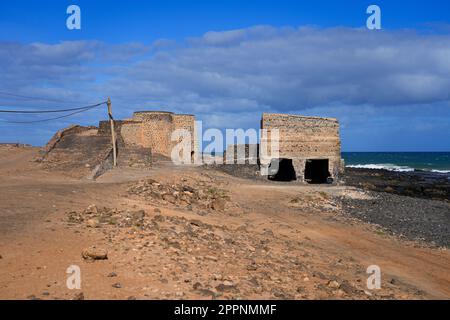 Abandoned ruins of the lime kilns of La Hondura, north of the capital city of Puerto del Rosario on Fuerteventura island in the Canaries, Spain - Crum Stock Photo
