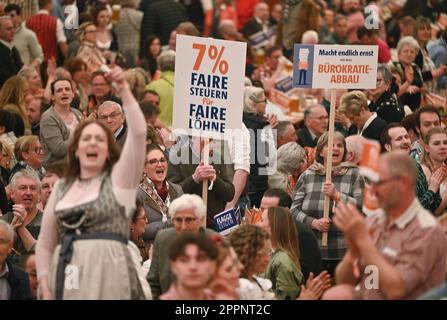 Stuttgart, Germany. 24th Apr, 2023. Restaurateurs take part in the political rally of the hotel and restaurant association DEHOGA Baden-Württemberg at the Stuttgart Spring Festival. The central topic is the fight for fair tax conditions. Credit: Marijan Murat/dpa/Alamy Live News Stock Photo