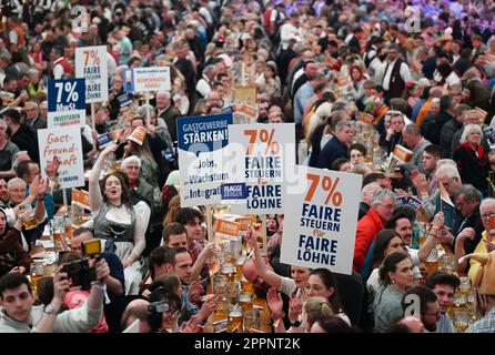Stuttgart, Germany. 24th Apr, 2023. Restaurateurs take part in the political rally of the hotel and restaurant association DEHOGA Baden-Württemberg at the Stuttgart Spring Festival. The central topic is the fight for fair tax conditions. Credit: Marijan Murat/dpa/Alamy Live News Stock Photo
