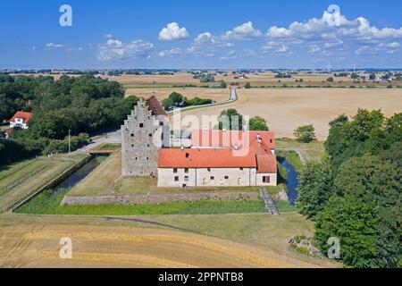 Aerial view over Glimmingehus, medieval castle at Simrishamn Municipality, Scania / Skåne in southern Sweden in summer Stock Photo