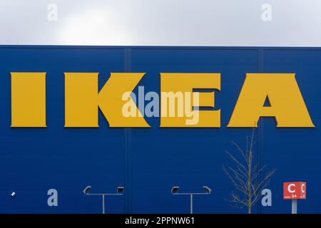 IKEA furniture store with its big, yellow logo sign in Kaiserslautern, Germany Stock Photo