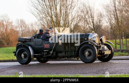 Stony Stratford, Bucks, UK, Jan 1st 2023. Three men in a 1936 Bentley 4.5 Blower vintage car Stock Photo
