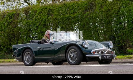 Bicester,Oxon,UK - April 23rd 2023.  1964 green Daimler SP250 - the Daimler Dart - travelling on an English country road Stock Photo