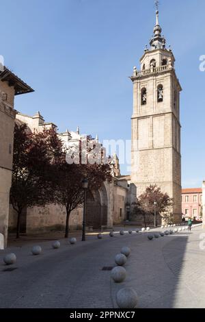 view of the tower of the collegiate church from a street that accesses the plaza del pan, Talavera de la Reina, Toledo, Spain Stock Photo