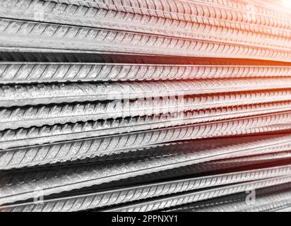 Steel bar or steel reinforcement bar. Construction armature. Reinforcements steel bars in row. The steel rebars. Steel rods bars texture background wi Stock Photo