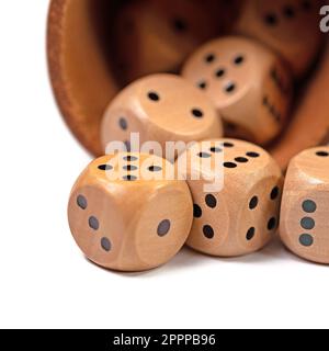 Dice and dice cup in a close-up Stock Photo