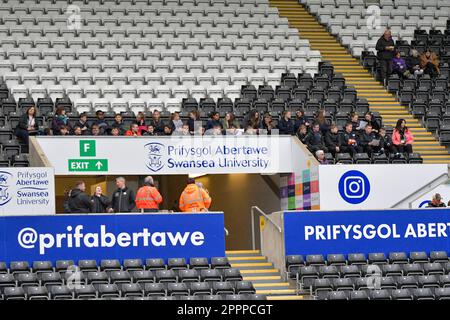 Swansea, Wales. 24 April 2023. Swansea City fans before the Professional Development League game between Swansea City Under 21 and Sheffield United Under 21 at the Swansea.com Stadium in Swansea, Wales, UK on 24 April 2023. Credit: Duncan Thomas/Majestic Media/Alamy Live News. Stock Photo