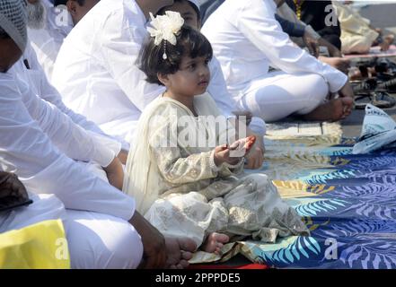 Kolkata, India. 22nd Apr, 2023. Child offer namaz or prayer on the occasion of Eid-ul-Fitr at Red Road on the occassion of Eid-ul-Fitr on April 22, 2023 in Kolkata, India. (Credit Image: © Saikat Paul/eyepix via ZUMA Press Wire) EDITORIAL USAGE ONLY! Not for Commercial USAGE! Stock Photo