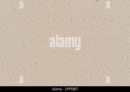 Beige color cardboard recycled paper, seamless tileable texture, image width 20cm Stock Photo