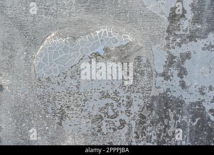 Metal plate wall with old cracked paint, flakes peeling - closeup detail, abstract grunge texture Stock Photo