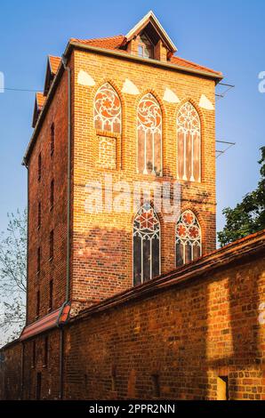 Torun, Poland - September 17, 2014: Historic Dovecote Tower (Baszta) in Torun, Poland. Gothic tower is a relic of medieval city walls that surround th Stock Photo