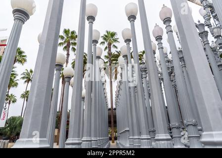 Los Angeles, CA - October 14, 2022:  Urban Light, a public art designed by Chris Burden and unveiled in 2008, next to the Los Angeles County Museum of Stock Photo