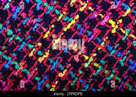 Black, yellow, pink, blue, green, tweed real fabric plaid or houndstooth texture seamless pattern Bright colors checkered  traditional seamless orname Stock Photo