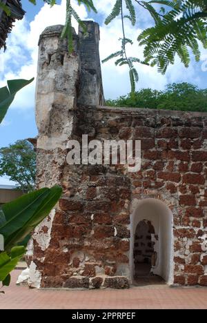 A fomosa is a weathered stone and brick ancient former Portuguese fort built in 1512 in Melacca, Malaysia. Stock Photo