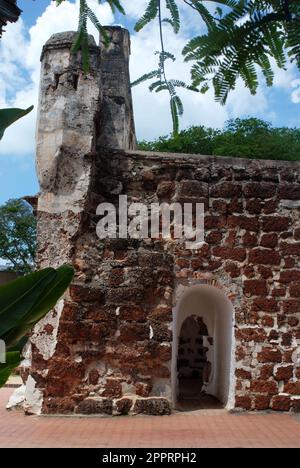 A fomosa is a weathered stone and brick ancient former Portuguese fort built in 1512 in Melacca, Malaysia. Stock Photo