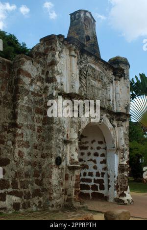 A fomosa is a weathered stone and brick ancient former Portuguese fort built in 1512 in Melacca, Malaysia. Stock Photo