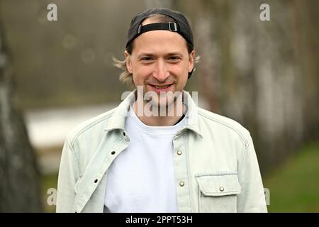 Rheinsberg, Germany. 19th Apr, 2023. Simon Triebel, guitarist from the band Juli, has his picture taken during a photo session at Landhaus Siebenwasser. The album new album of the band Juli, called 'The summer is over', will be released on 28.04.2023. Credit: Michael Bahlo/dpa/Alamy Live News Stock Photo