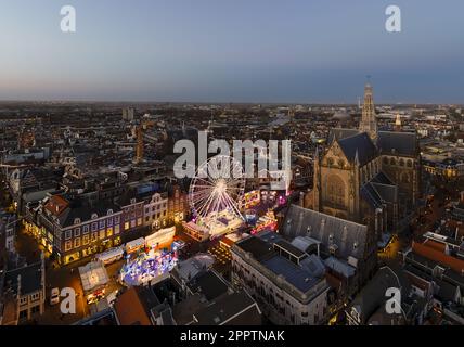 The Grote Kerk or St.-Bavokerk is a Reformed Protestant church and former Catholic cathedral located on the central market square (Grote Markt) in the Stock Photo