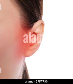 Woman suffering from ear pain on white background, closeup Stock Photo