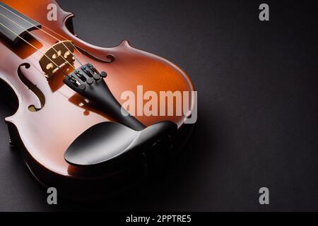 Violin on black table with copy space. Stock Photo