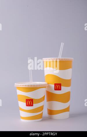 MYKOLAIV, UKRAINE - AUGUST 12, 2021: Cold McDonald's drinks on light background Stock Photo