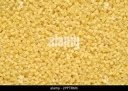Small Piombino pasta for soup texture or background. Stock Photo